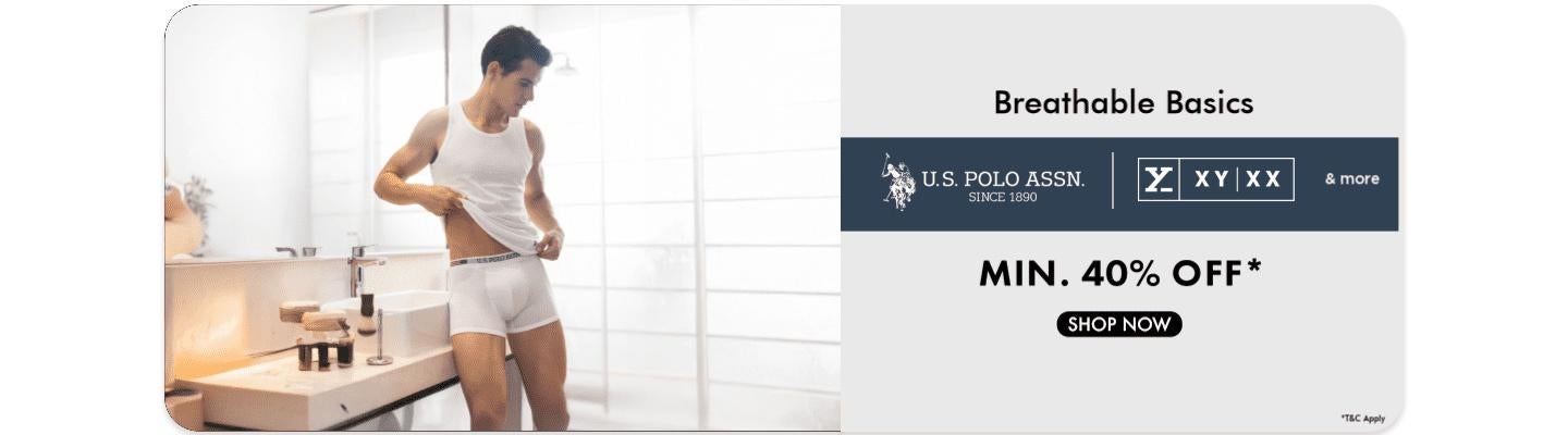 Minimum 40 percent off breathable basics from US Polo Assn featuring a man in a white tank top and white boxer briefs.