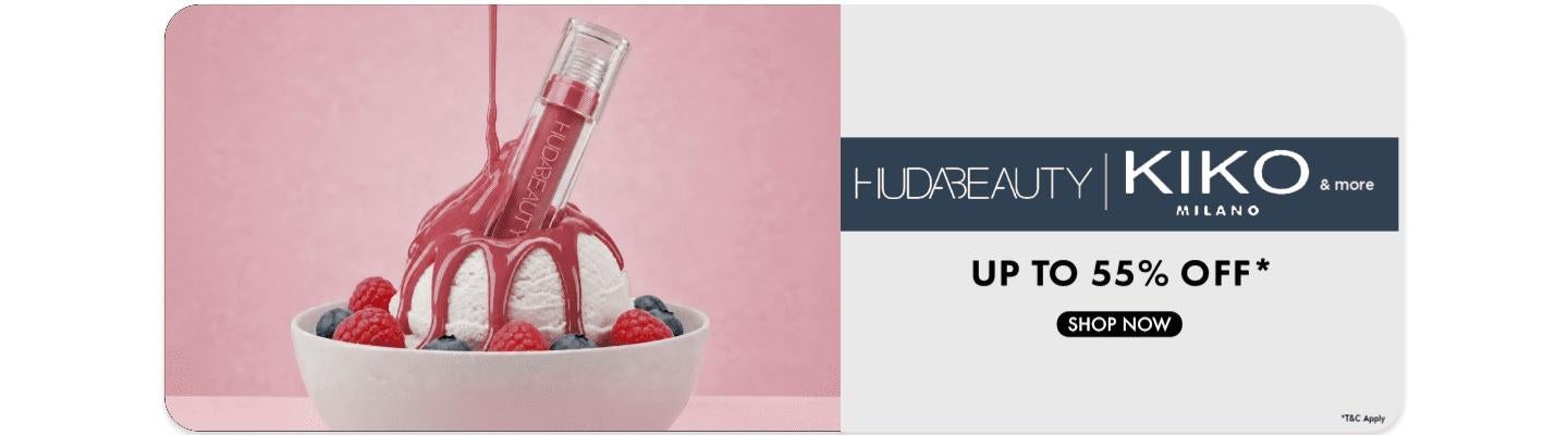 Up to 55 percent off Huda Beauty and Kiko Milano products featuring a lip gloss in ice cream with berries and a shop now button.